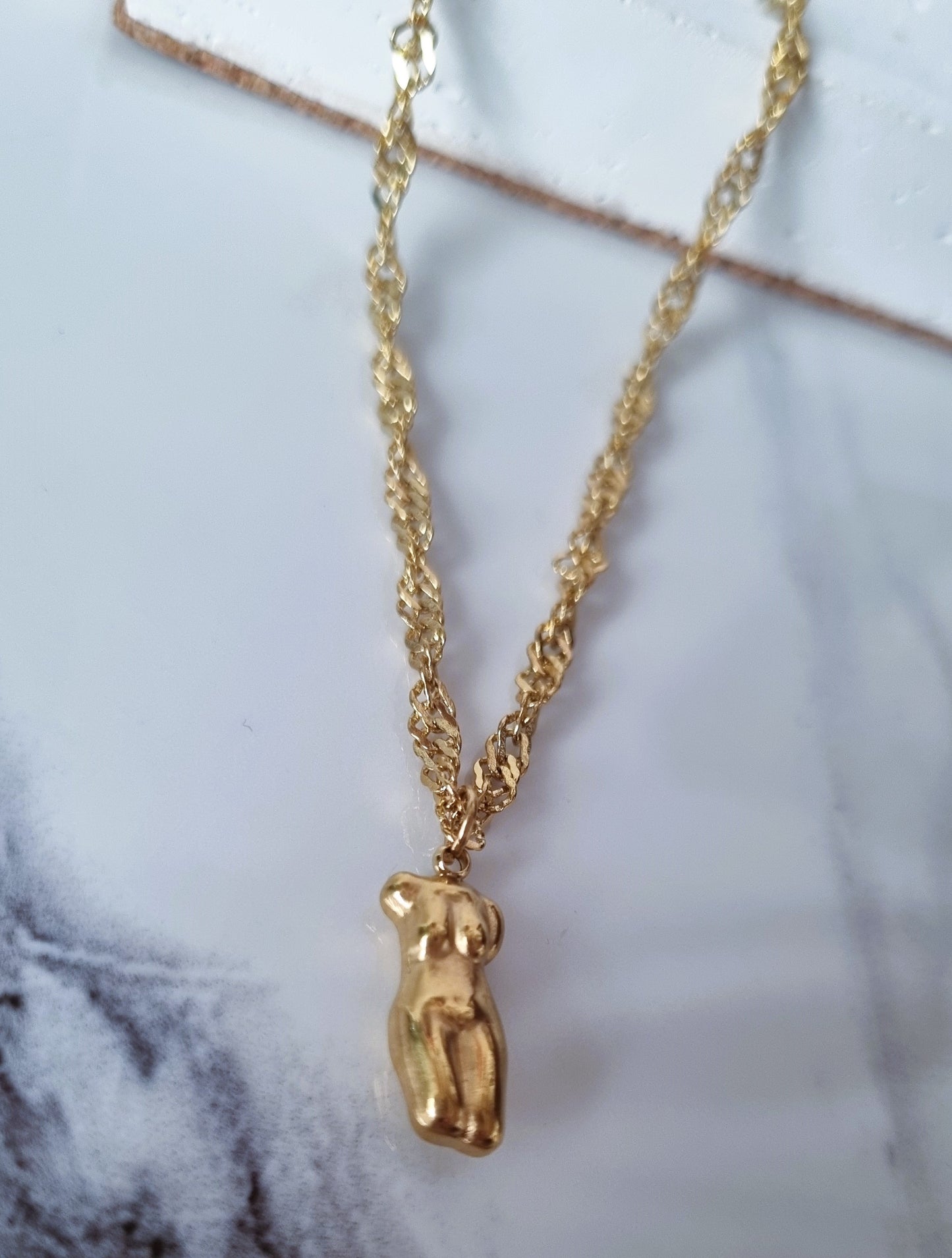 Gold body necklace