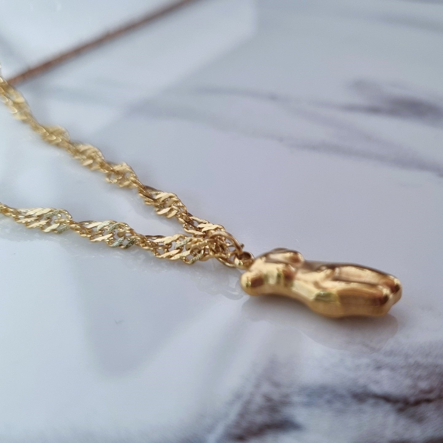 Gold body necklace