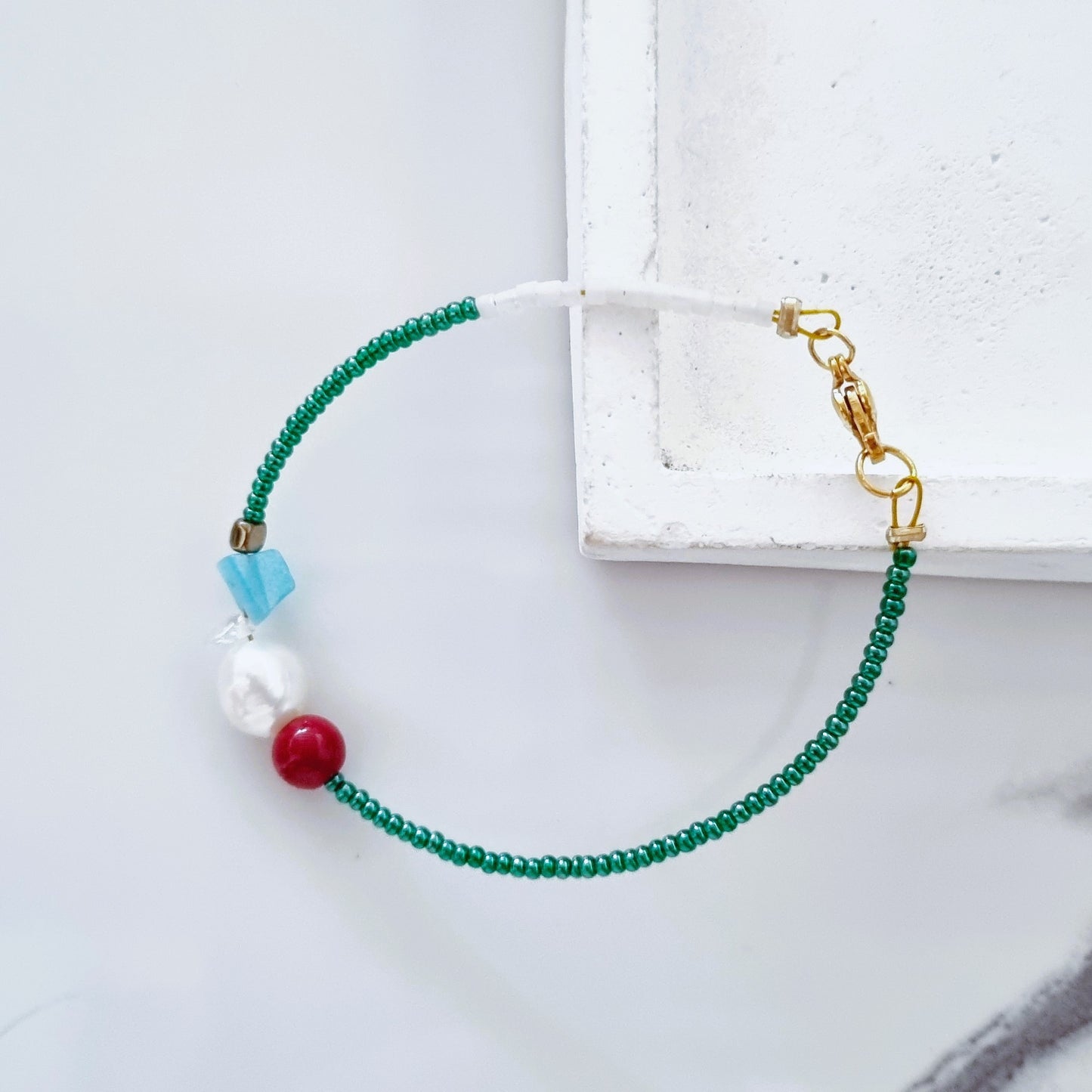 Pearly petrol bracelets