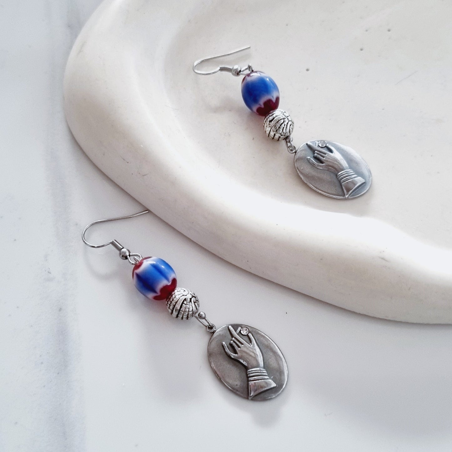 Touch me there earrings ed.