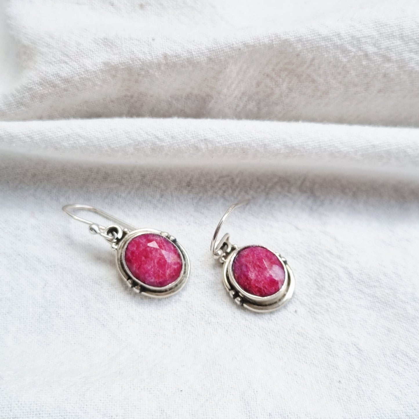 Oval ruby silver earrings