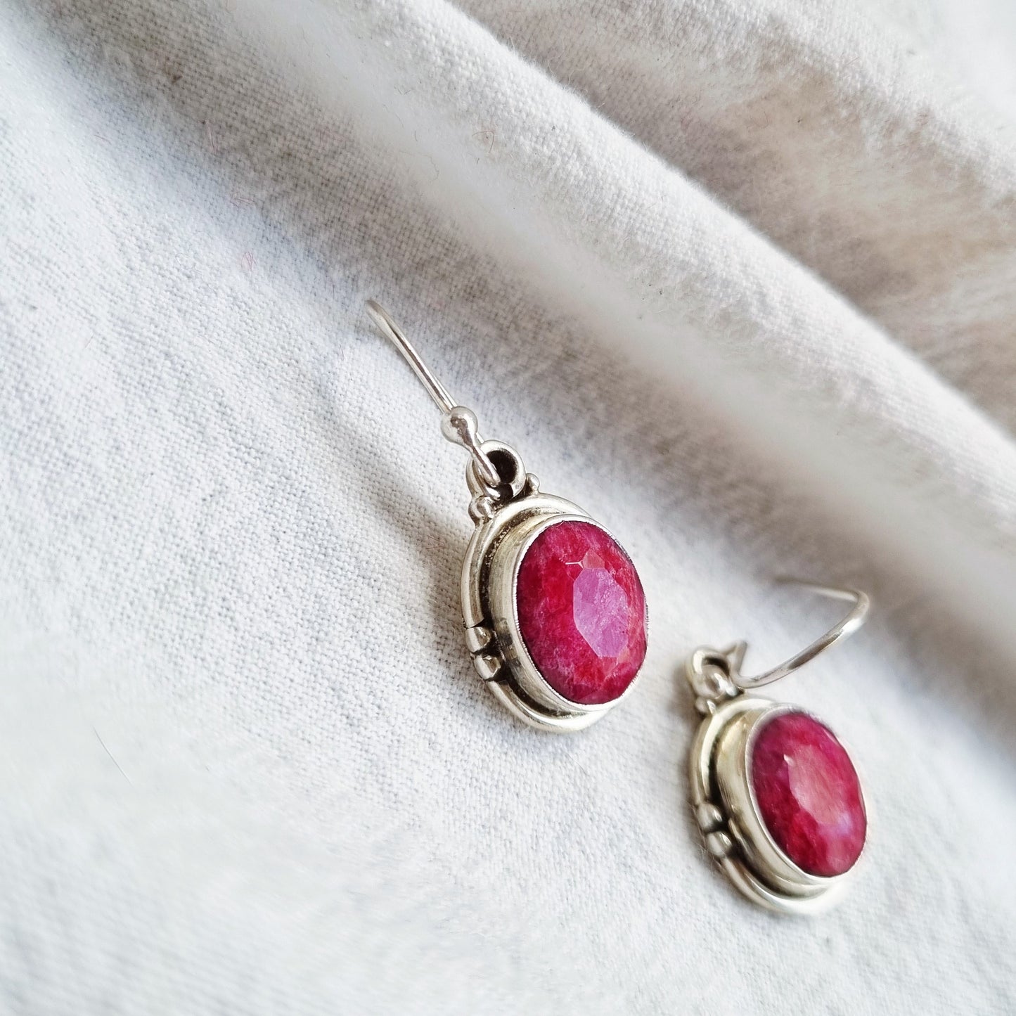 Oval ruby silver earrings