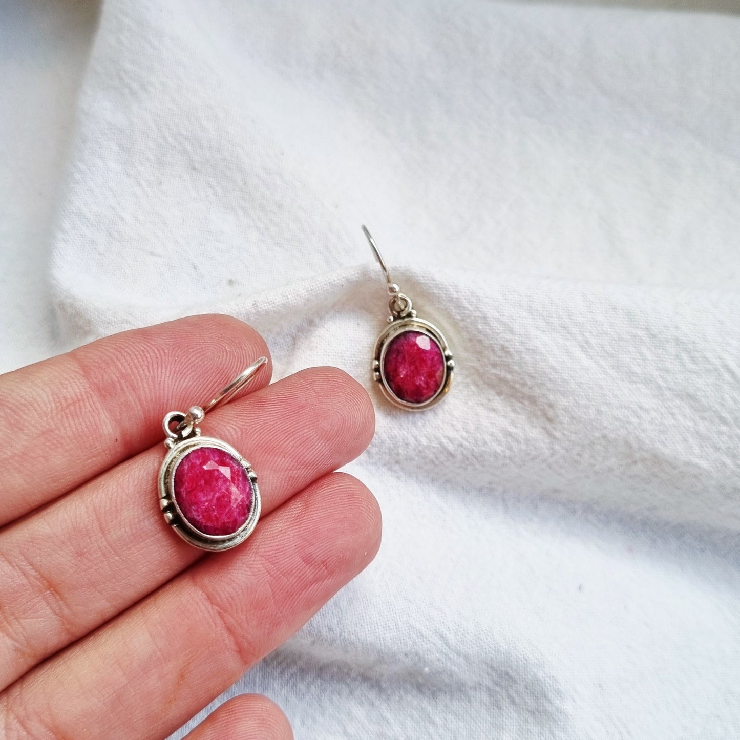 Oval ruby silver earrings