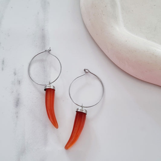 Precious tooth earrings