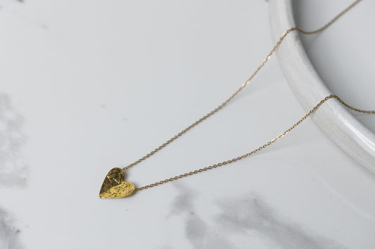Gold semi-flip heart necklace